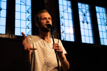 Jacob Adriani on stage (Comedy Spotlight)